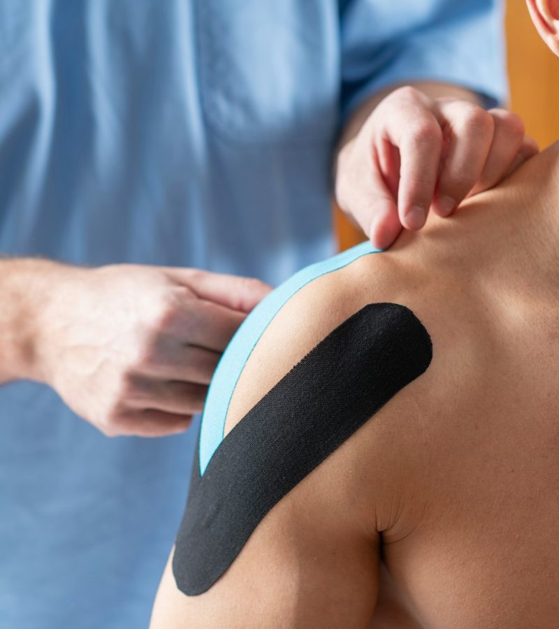 elastic-therapeutic-tape-application-on-the-shoulder-for-support-and-rehabilitation-